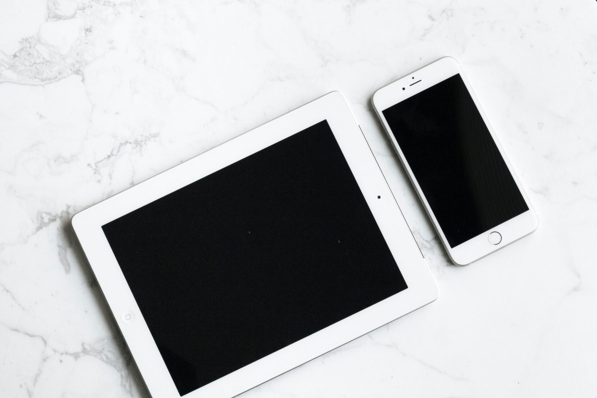 Tablet & Mobile on Table Photo 1